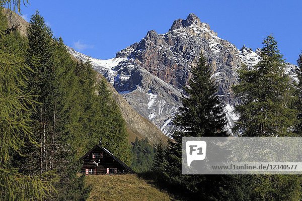 Parkhütte Varusch at the begininning of Swiss National Park with Piz Saliente in the background val Trupchun S-Chanf Engadin Canton Grisons Switzerland Europe.