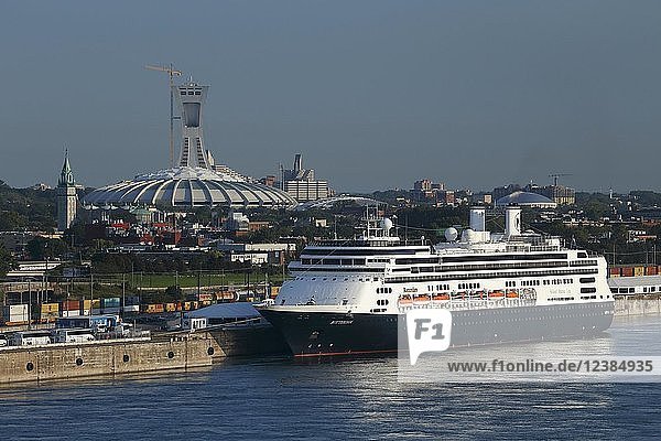 Cruise ship Rotterdam with Olympic Stadium behind  Old Port  Montreal  Quebec Province  Canada  North America