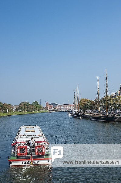 Excursion ship and Traditional sailing boat on the Untertrave  Lübeck  Schleswig-Holstein  Germany  Europe