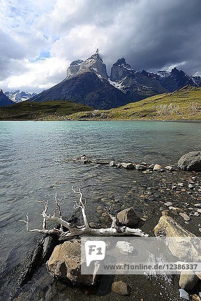View over Lake Pehoe to the mountains Los Cuernos with clouds  National Park Torres del Paine  Province Última Esperanza  Chile  South America