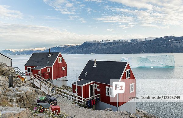 Small town Uummannaq in the north of west greenland. Background the glaciated Nuussuaq (Nugssuaq) Peninsula. America  North America  Greenland  Denmark.