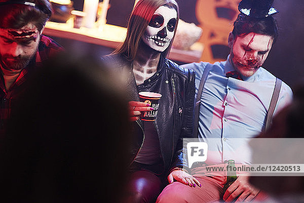 Couple in creepy costume at Halloween party