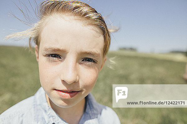 Portrait of confident boy outdoors