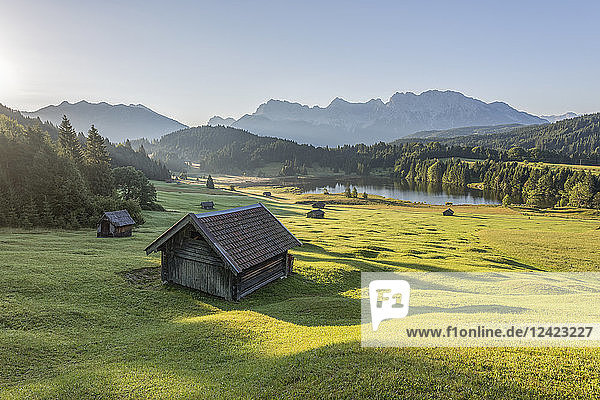 Germany  Bavaria  Werdenfelser Land  lake Geroldsee with hay barn  in background the Karwendel mountains