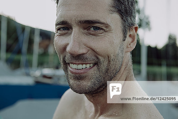 Portrait of smiling man at marina
