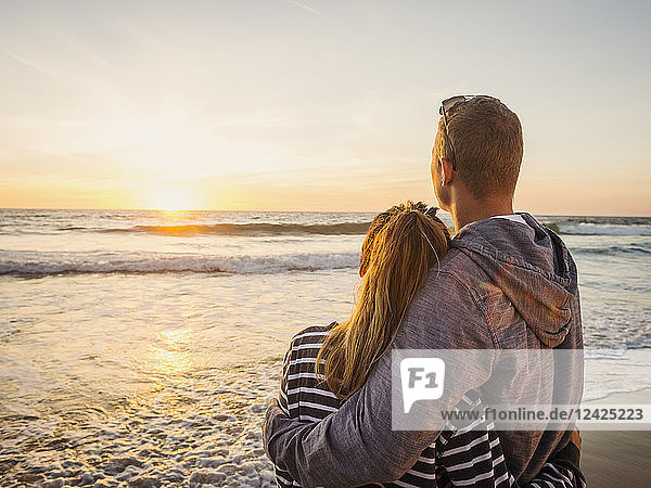 Couple looking at sunset