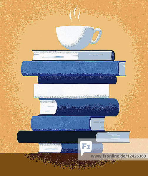 Cup of tea on top of pile of books