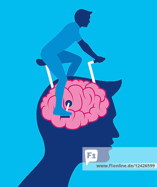 Man exercising brain riding exercise bike