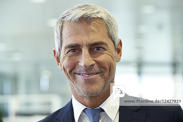 Close-up of businessman smiling