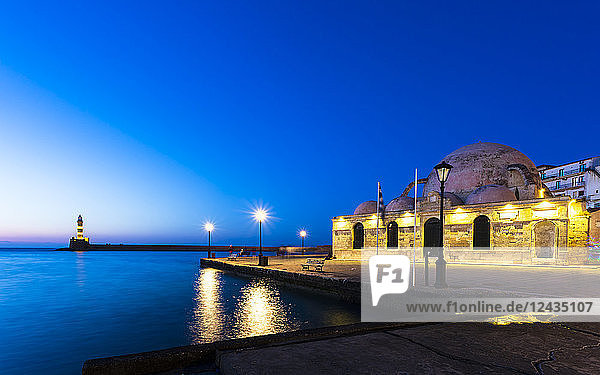 Lighthouse at Venetian port and Turkish Mosque Hassan Pasha at night  Chania  Crete  Greek Islands  Greece  Europe