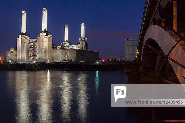 Battersea Power Station and Battersea Bridge at night London England United Kingdom Europe