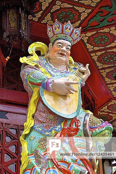 Statue of Dhrtarastra  one of The Four Heavenly Kings at Wong Tai Sin Temple  Hong Kong  China  Asia