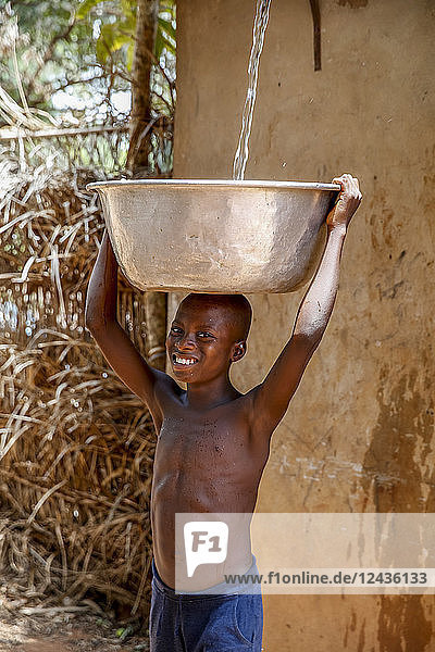 Collecting water in a Zou province village  Benin  West Africa  Africa