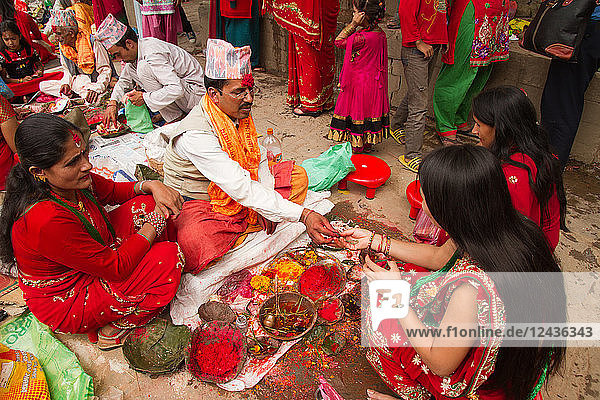 Women of Nepal celebrate Teej  a festival which blesses the men in their lives  Durbar Square  Kathmandu  Nepal  Asia