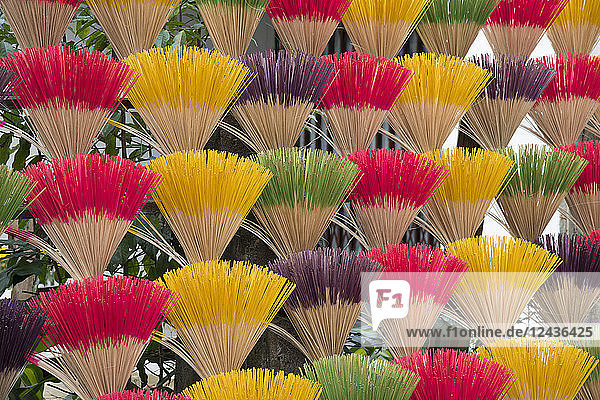 Colourful scented incense sticks drying near the Tomb of the Emperor Khai Dinh near Hue Vietnam Indochina Southeast Asia Asia