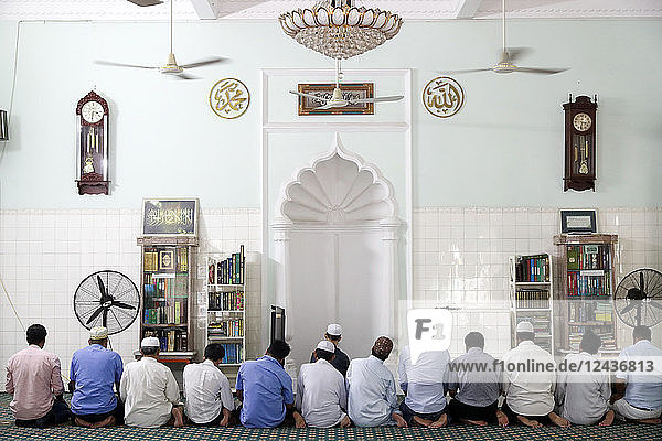 Muslim men praying  Saigon Central Mosque  Ho Chi Minh City  Vietnam  Indochina  Southeast Asia  Asia