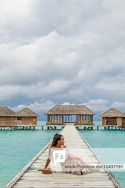 Relaxing at the Conrad Maldives Rangali Island over water yoga studio  Maldives  Indian Ocean  Asia