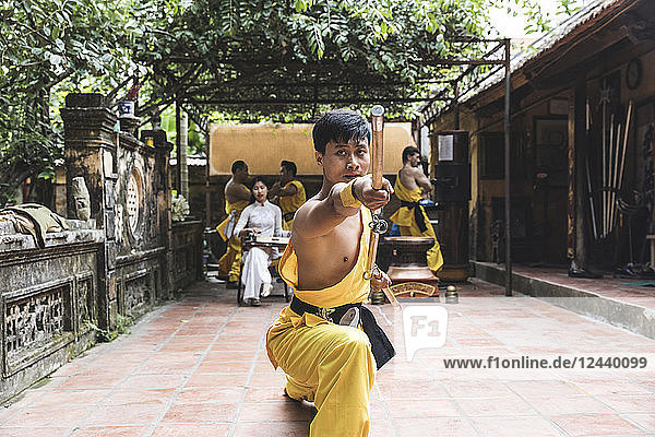 Vietnam  Hanoi  young man exercising Kung Fu