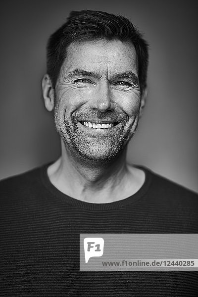 Portrait of smiling man  black and white