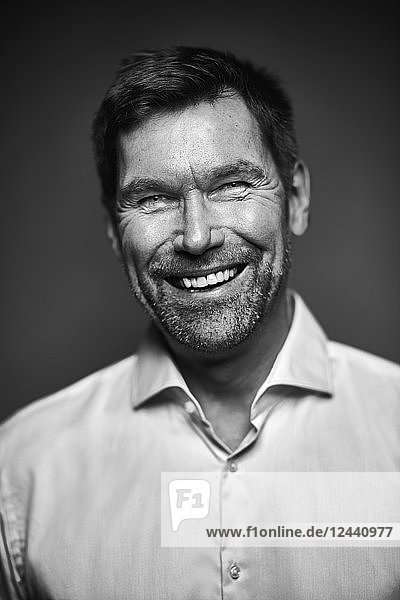 Portrait of smiling man  black and white