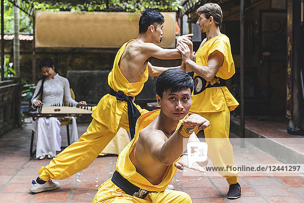 Vietnam  Hanoi  men exercising Kung Fu