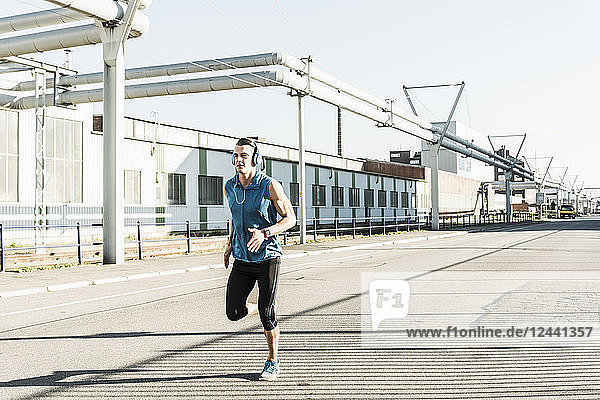 Young athlete jogging in the city