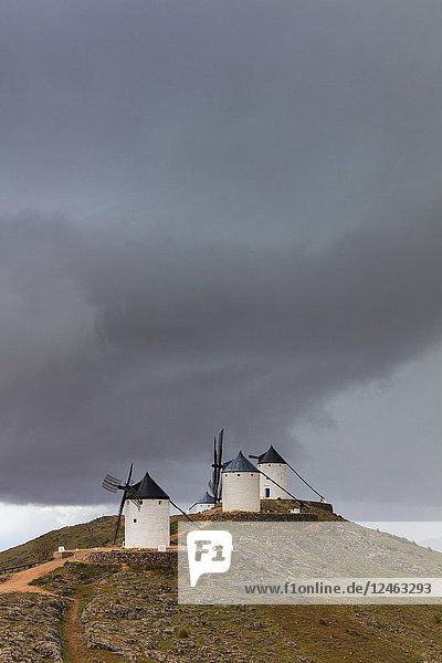 Storm clouds on windmills of Consuegra  Don Quixote route  Toledo province  Castile-La Mancha region  Spain.
