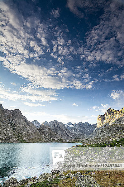 Scenic panorama of the Upper Lake in Titcomb Basin Wind River Range Bridger Teton National Forest Pinedale Wyoming.