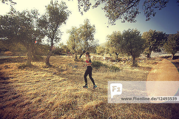 Woman running in forest  Antalya Ka?ü Turkey