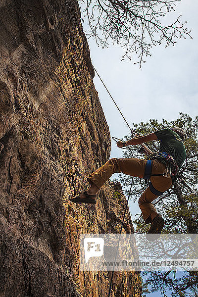 Man Rappels On Rock Near Flagstaff Arizona