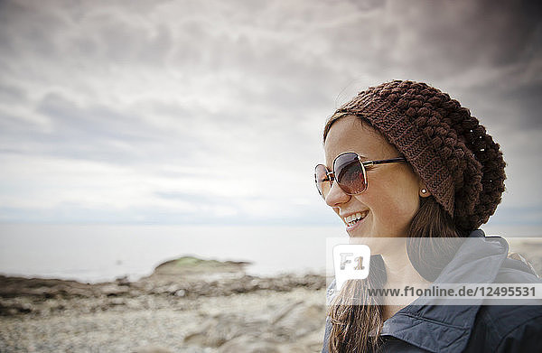 Portrait of a young woman at the beach.