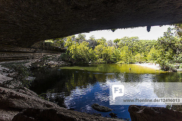 Near Wimberley  Texas  the Hamilton Pool is a popular swimming hole for tourists and locals in the hot  dry summer.