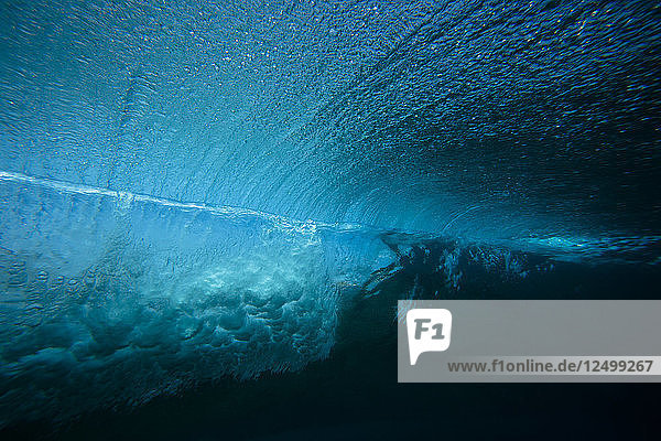 The Underwater View Of A Breaking Wave In The Maldives