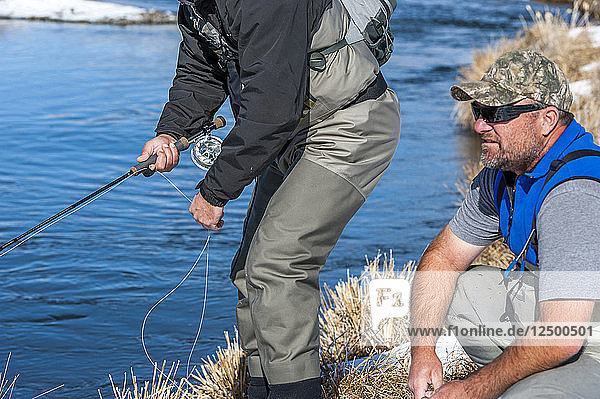 Fisherman Fly Fishing On The Upper Owens River