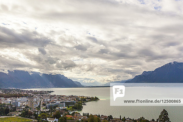 The town of Vevey on the shores of Lake Geneva near Lausanne in Switzerland. Across the lake are mountains in France.