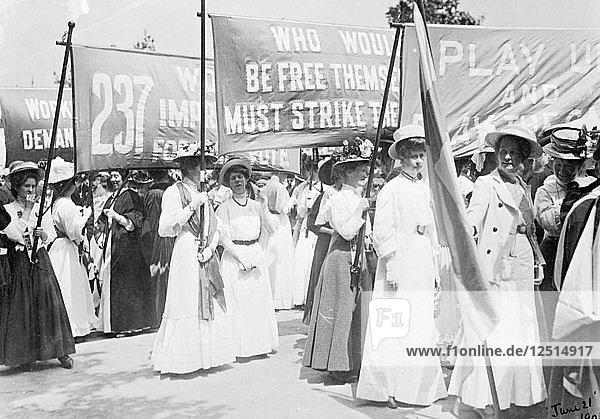 Suffragettes on the Euston Road procession carrying banners to Womens Sunday  London  1908. Artist: Unknown