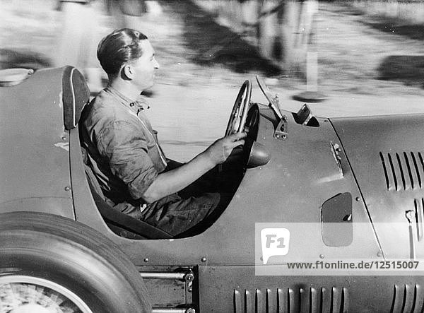Alberto Ascari at the wheel of a racing car. Artist: Unknown