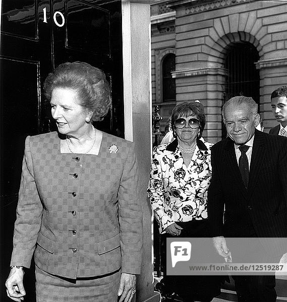 Yitzhak Shamir and his wife with Margaret Thatcher at No 10 Downing Street  May 1989. Artist: Sidney Harris