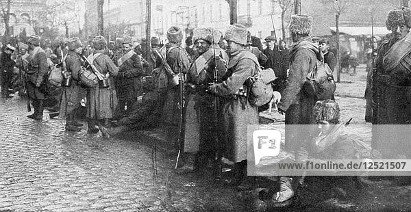 Russian Siberian infantry troops in Warsaw Poland 1914. Artist: Unknown