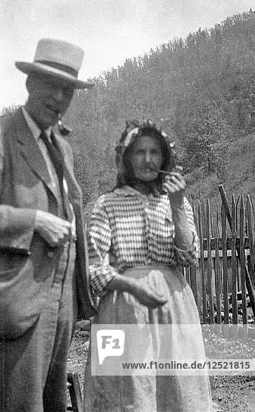Cecil Sharp and Aunt Betsy smoking pipes  Appalachia  USA  c1917. Artist: Unknown