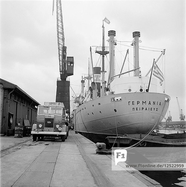 A ship unloading in West India Docks  London  c1945-c1965. Artist: SW Rawlings