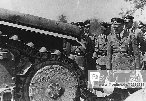 Adolf Hitler inspecting a destroyed French tank  France  World War II  1940. Artist: Unknown