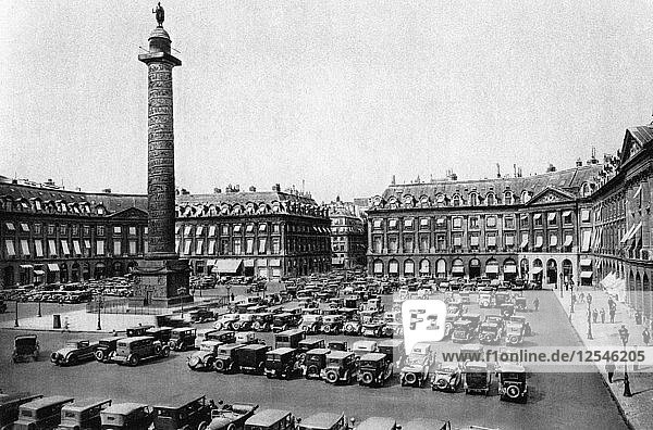 Place Vendome and the column erected to Napoleons victories  Paris  1931. Artist: Ernest Flammarion