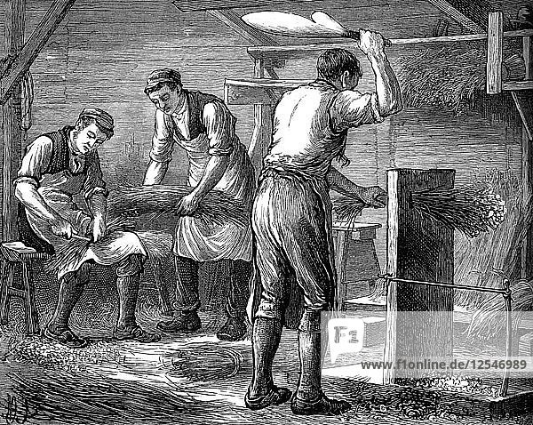 Hand-scutchers at work  c1880. Artist: Unknown