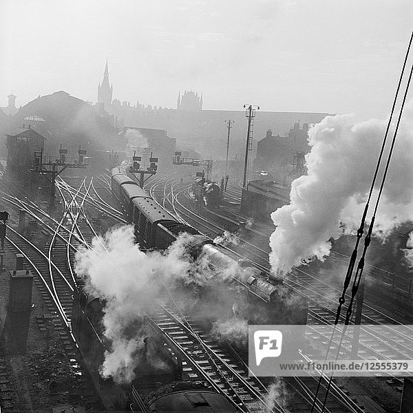 Steam trains at Kings Cross  London  1946-1969. Artist: John Gay