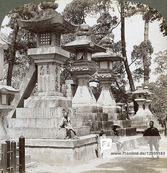 Stone lanterns at Sumiyoshi  Osaka  Japan  1904. Artist: Underwood & Underwood