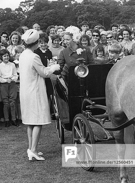 Princess Anne wins a cup in the pony and trap rally at Smiths Lawn Windsor June 1969. Artist: Unknown