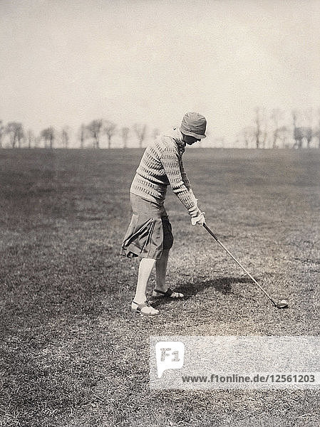 A lady golfer playing at Falsterbo Colf Club Sweden. Artist: Otto Ohm