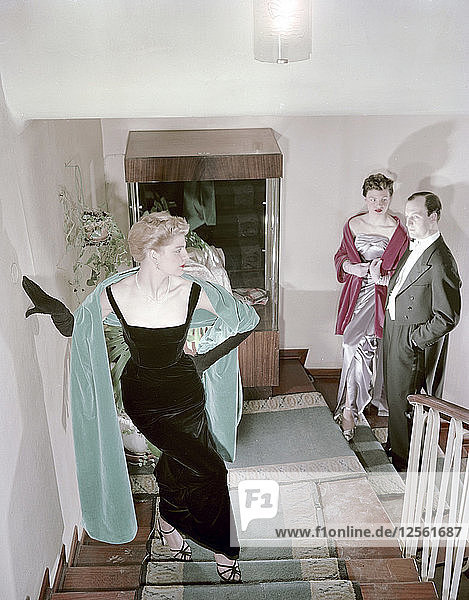 Female model shows an evening dress  Stockholm  1950s. Artist: Göran Algård