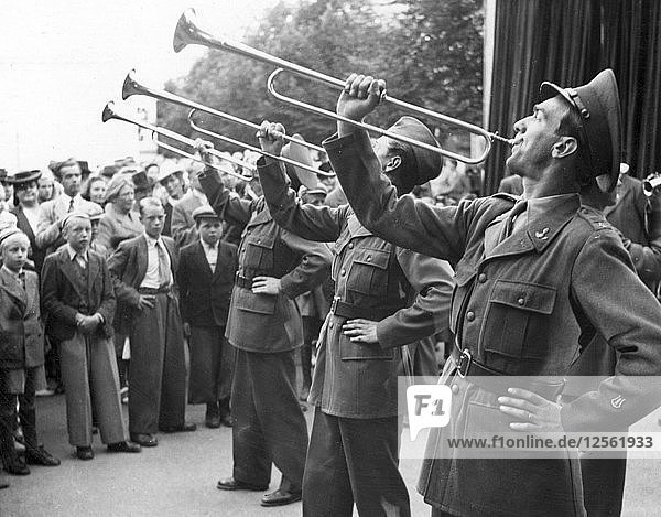 Fanfare by military trumpeters  celebration in the market place  Trelleborg  Sweden  1946. Artist: Unknown